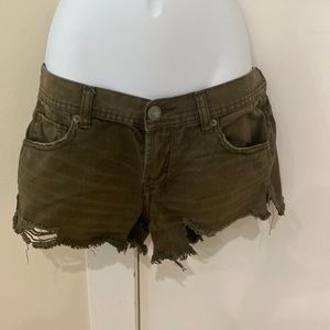 Free people distressed shark bite army green denim shorts size 25 (EUC)